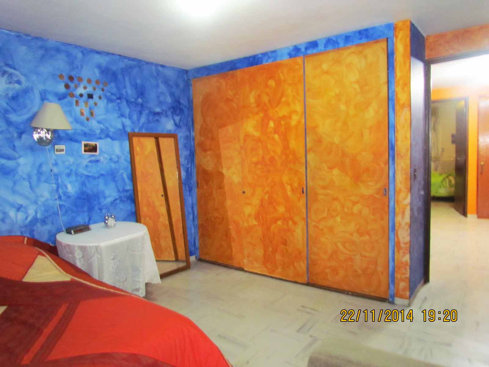 HABITACIÓN NARANZA AZUL